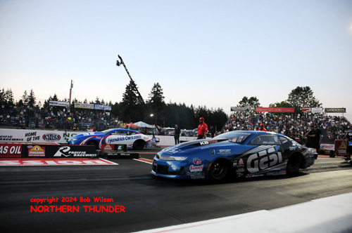 Eric Latino (near lane) vs Greg Anderson (far lane)